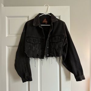 Distressed denim jacket